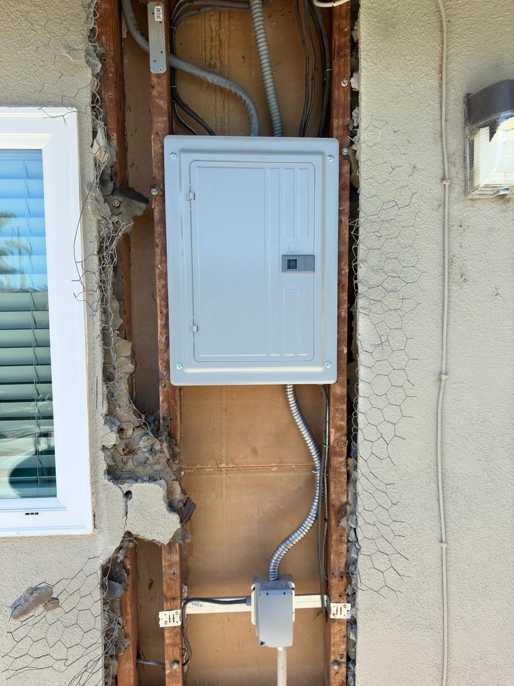 Residential electrical panel replacement in progress